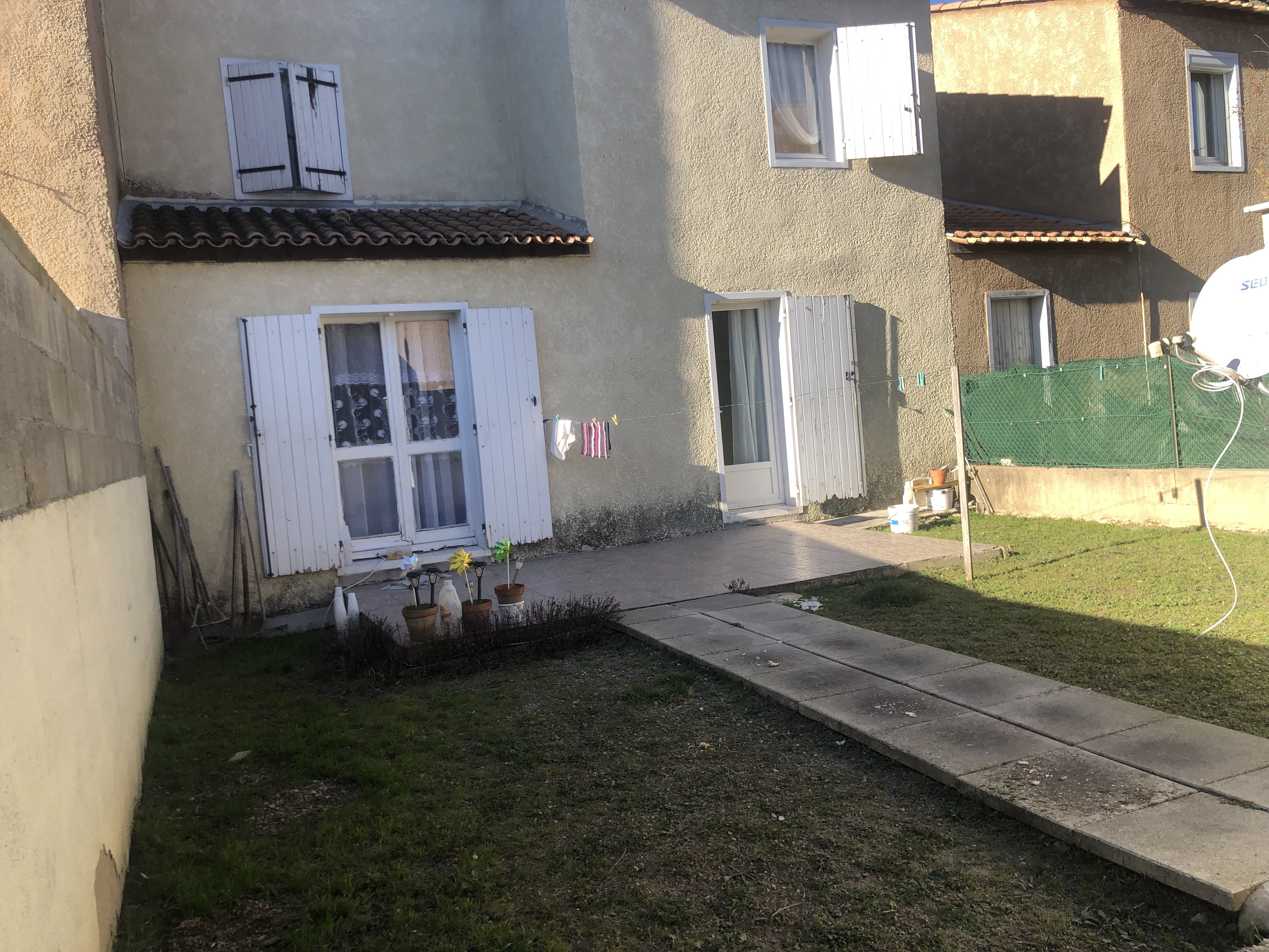 Maison T5 avec garage et jardin
